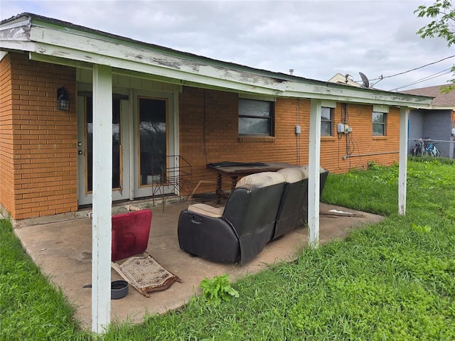 3401 SW Abilene Dr, Lawton, OK 73501 - back of house featuring brick siding