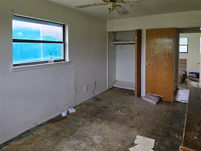 3401 SW Abilene Dr, Lawton, OK 73501 - unfurnished bedroom featuring multiple windows, a closet, and a ceiling fan