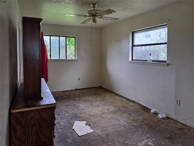 3401 SW Abilene Dr, Lawton, OK 73501 - unfurnished room featuring a textured ceiling and a ceiling fan