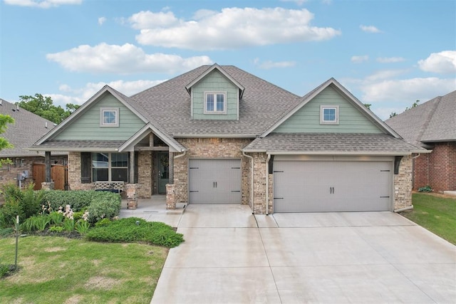 8400 Poplar Dr, Edmond, OK 73034 - craftsman inspired home with a shingled roof, driveway, brick siding, and a porch