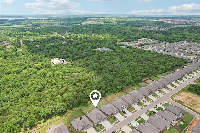 8400 Poplar Dr, Edmond, OK 73034 - aerial perspective of suburban area featuring a heavily wooded area