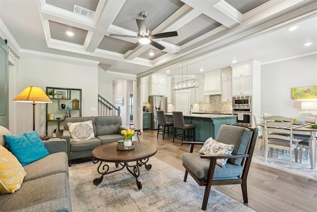 8400 Poplar Dr, Edmond, OK 73034 - living room with coffered ceiling, ornamental molding, ceiling fan, beam ceiling, and stairway