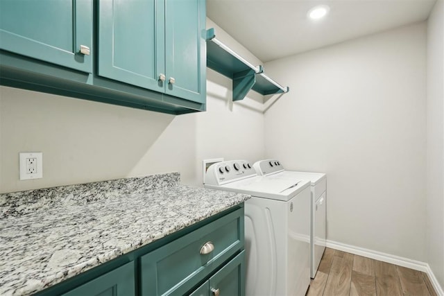 8400 Poplar Dr, Edmond, OK 73034 - laundry room with cabinet space, independent washer and dryer, light wood-type flooring, and recessed lighting