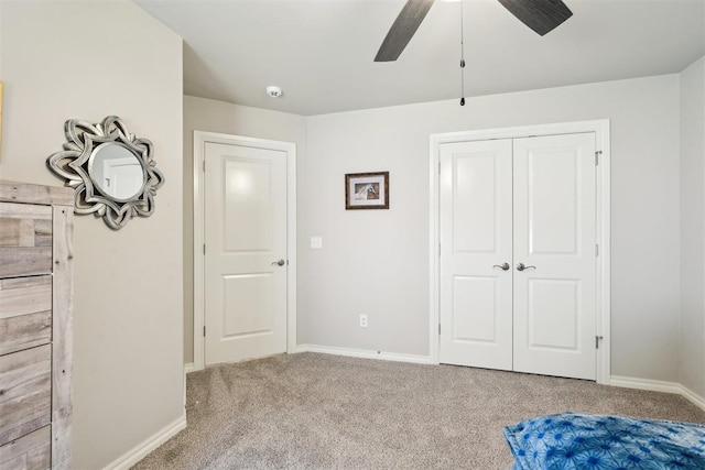 8400 Poplar Dr, Edmond, OK 73034 - unfurnished bedroom featuring carpet floors, a closet, and ceiling fan