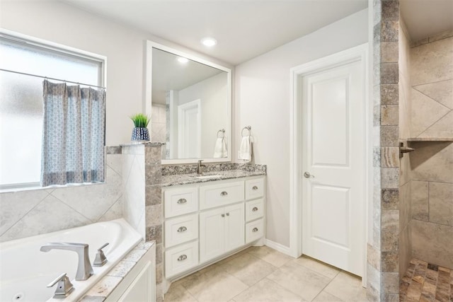 8400 Poplar Dr, Edmond, OK 73034 - full bathroom with a jetted tub, vanity, and a tile shower