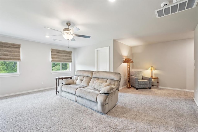 8400 Poplar Dr, Edmond, OK 73034 - carpeted living room featuring healthy amount of natural light and ceiling fan