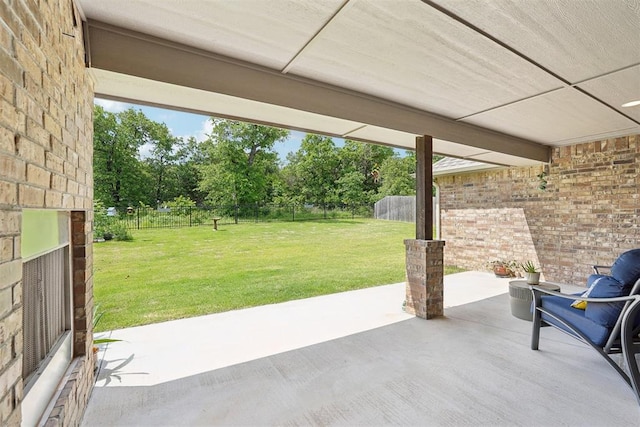 8400 Poplar Dr, Edmond, OK 73034 - fenced backyard with a patio area