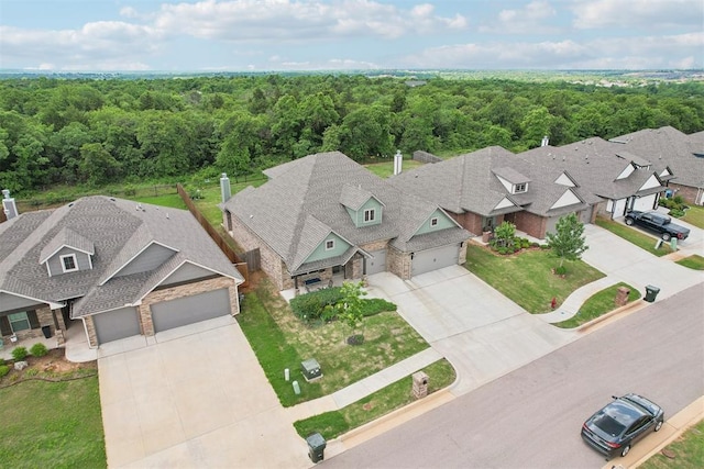 8400 Poplar Dr, Edmond, OK 73034 - aerial view of residential area with a forest