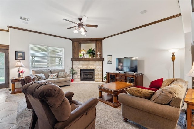 12812 NW 6th St, Yukon, OK 73099 - living area featuring crown molding, a ceiling fan, a fireplace, and light tile patterned flooring