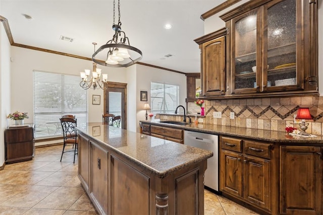 12812 NW 6th St, Yukon, OK 73099 - kitchen featuring dishwasher, a sink, light tile patterned floors, a chandelier, and decorative backsplash