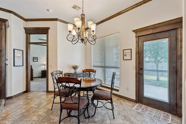 12812 NW 6th St, Yukon, OK 73099 - dining room featuring ornamental molding, a chandelier, light tile patterned floors, and baseboards