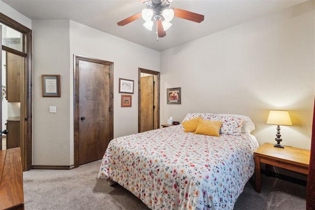 12812 NW 6th St, Yukon, OK 73099 - bedroom with carpet floors, baseboards, and a ceiling fan