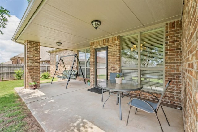 12812 NW 6th St, Yukon, OK 73099 - view of patio featuring fence