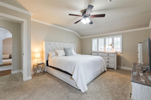 2728 Kerry Ln, Oklahoma City, OK 73120 - bedroom featuring light carpet, arched walkways, crown molding, ceiling fan, and lofted ceiling