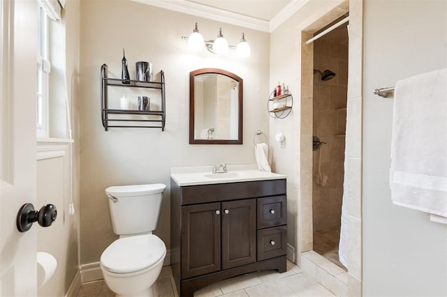 2728 Kerry Ln, Oklahoma City, OK 73120 - bathroom with crown molding, vanity, tiled shower, and tile patterned flooring