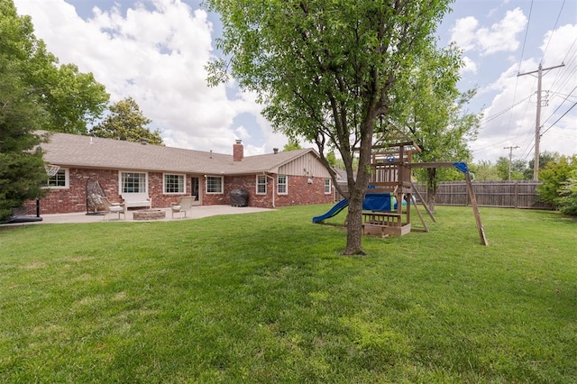 2728 Kerry Ln, Oklahoma City, OK 73120 - view of yard featuring a patio area and a playground