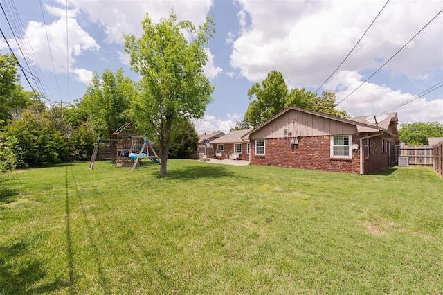 2728 Kerry Ln, Oklahoma City, OK 73120 - view of yard with a playground and a patio area