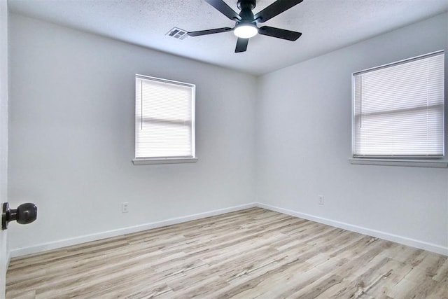 2528 Oakridge Dr, Bethany, OK 73008 - empty room with wood finished floors, ceiling fan, and baseboards