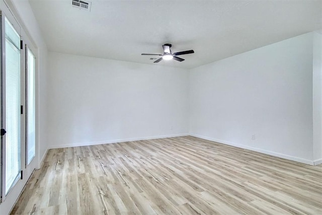 2528 Oakridge Dr, Bethany, OK 73008 - unfurnished room featuring light wood-type flooring, a ceiling fan, and baseboards