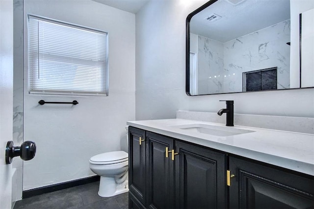 2528 Oakridge Dr, Bethany, OK 73008 - full bathroom with vanity, toilet, and baseboards