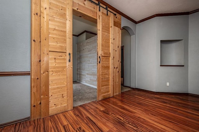 2105 SW 124th St, Oklahoma City, OK 73170 - empty room with ornamental molding, wood finished floors, and arched walkways