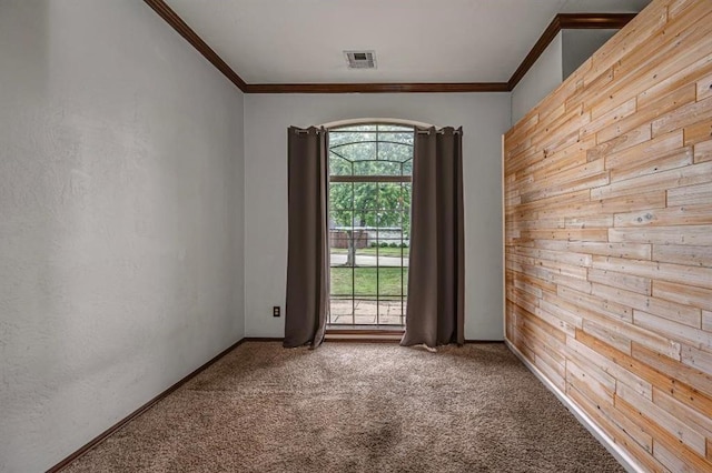 2105 SW 124th St, Oklahoma City, OK 73170 - carpeted empty room with plenty of natural light, wooden walls, and ornamental molding