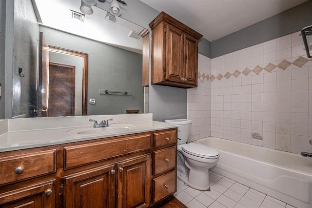 2105 SW 124th St, Oklahoma City, OK 73170 - bathroom with tile patterned flooring, toilet, vanity, and shower / bathtub combination