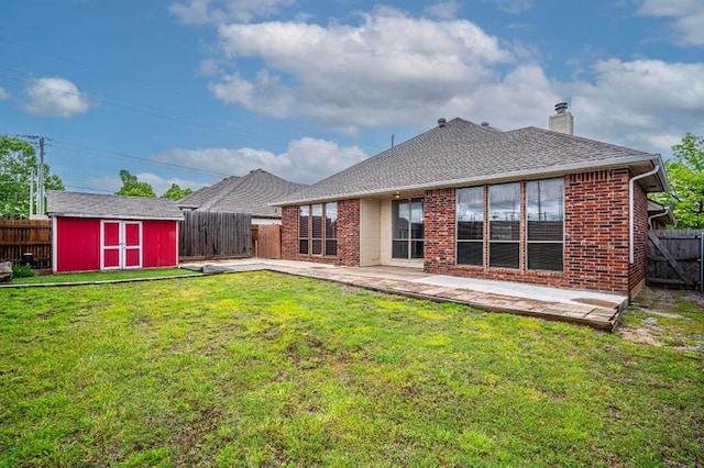 2105 SW 124th St, Oklahoma City, OK 73170 - back of property featuring a storage shed, an outdoor structure, a chimney, and brick siding