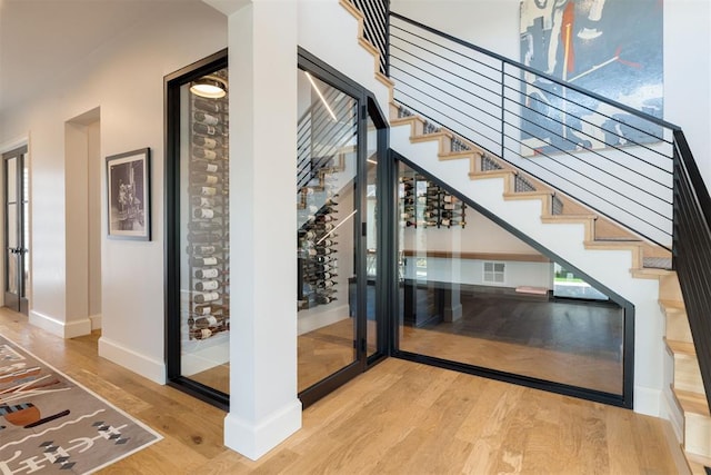 909 NW 156th St, Edmond, OK 73013 - wine room featuring wood finished floors and baseboards