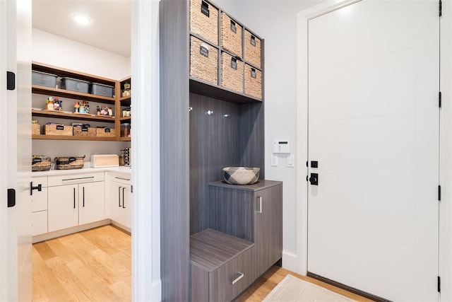 909 NW 156th St, Edmond, OK 73013 - mudroom with light wood finished floors