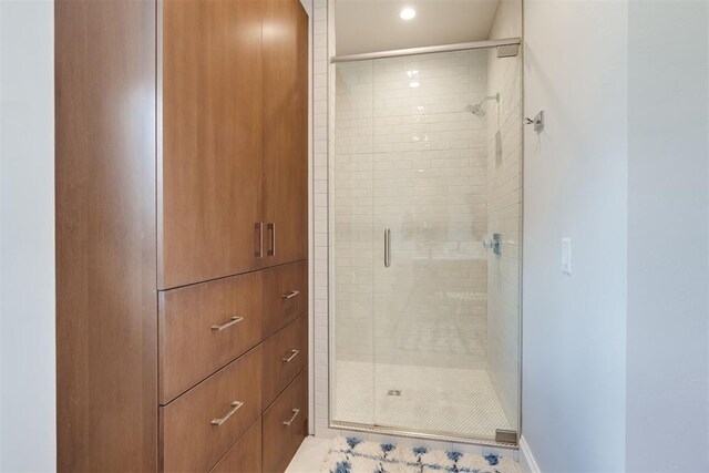 909 NW 156th St, Edmond, OK 73013 - bathroom with a stall shower and recessed lighting