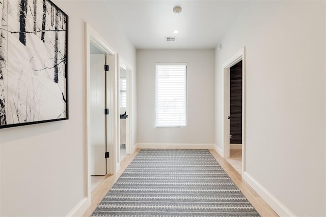 909 NW 156th St, Edmond, OK 73013 - hall with light wood-style floors and baseboards
