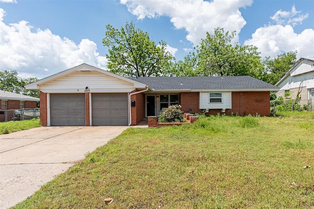 single story home featuring brick siding, a garage, and driveway