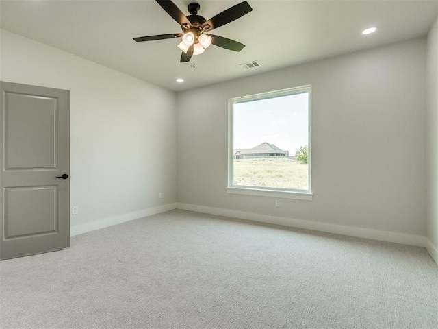 4850 Ranchero Dr, Edmond, OK 73025 - spare room featuring baseboards, light carpet, a ceiling fan, and recessed lighting