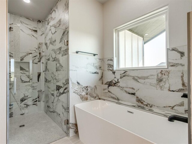 4850 Ranchero Dr, Edmond, OK 73025 - full bath with a marble finish shower, a soaking tub, tile walls, and recessed lighting