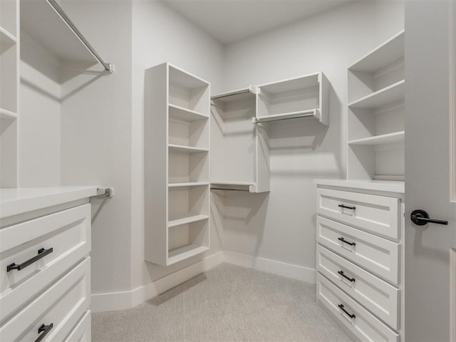 4850 Ranchero Dr, Edmond, OK 73025 - spacious closet featuring light colored carpet