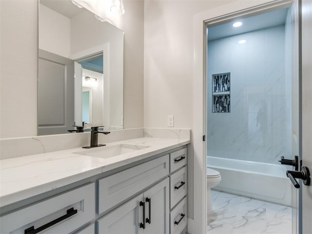 4850 Ranchero Dr, Edmond, OK 73025 - bathroom with vanity, toilet, marble look tiles, and  shower combination