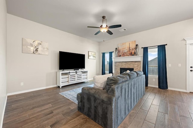 9117 NW 123rd St, Yukon, OK 73099 - living area featuring ceiling fan, wood finished floors, a fireplace, and baseboards