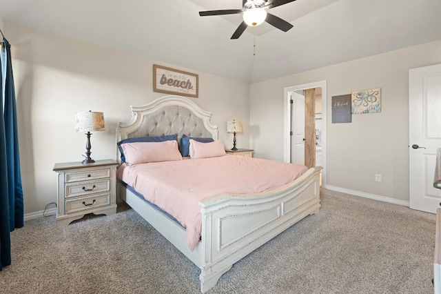 9117 NW 123rd St, Yukon, OK 73099 - carpeted bedroom with baseboards, ensuite bathroom, and ceiling fan