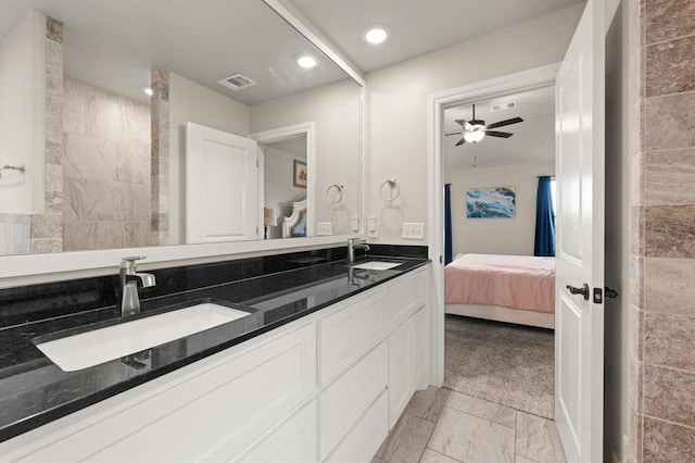 9117 NW 123rd St, Yukon, OK 73099 - full bathroom featuring ensuite bath, a ceiling fan, double vanity, and recessed lighting