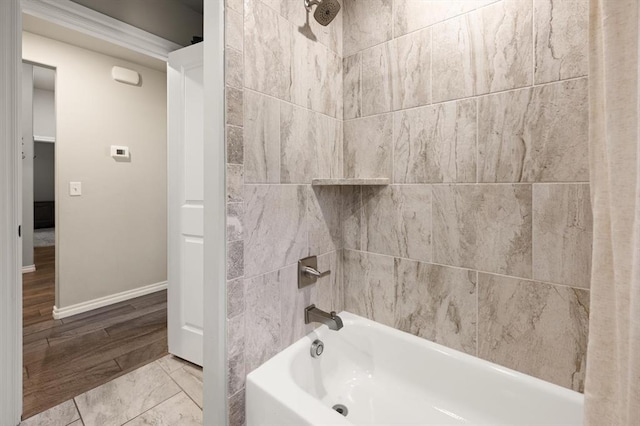 9117 NW 123rd St, Yukon, OK 73099 - bathroom featuring shower / washtub combination and baseboards