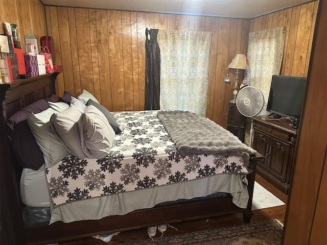 621 NW 50th St, Oklahoma City, OK 73118 - bedroom featuring wood walls and wood finished floors