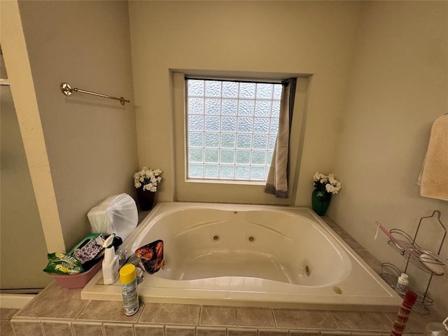 full bathroom featuring a tub with jets