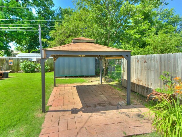 3208 NW 34th St, Oklahoma City, OK 73112 - view of patio / terrace with a gazebo and a carport