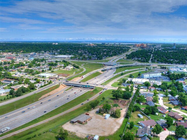 3208 NW 34th St, Oklahoma City, OK 73112 - aerial overview of property's location featuring a major roadway