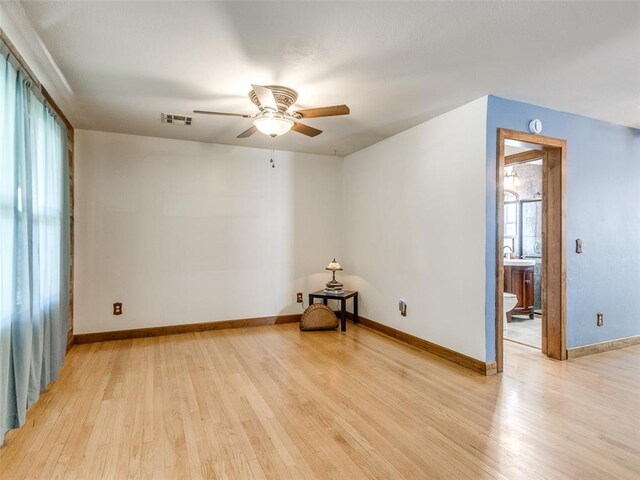 3208 NW 34th St, Oklahoma City, OK 73112 - empty room with ceiling fan, light wood-type flooring, and baseboards