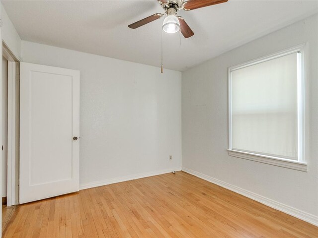 3208 NW 34th St, Oklahoma City, OK 73112 - empty room with light wood-type flooring, baseboards, and a ceiling fan