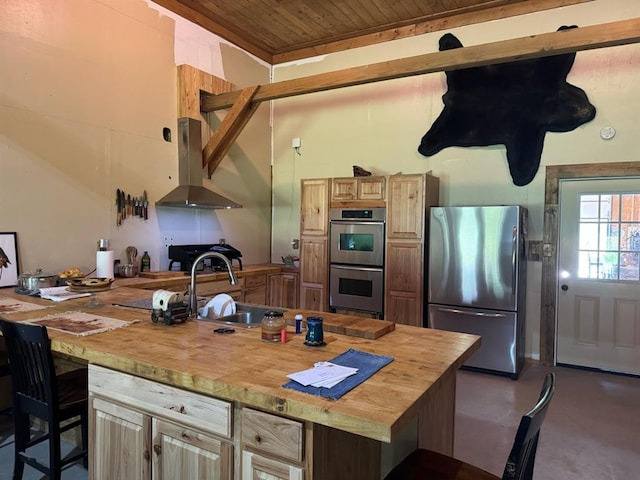 377056 E 1040th Rd, Okemah, OK 74859 - kitchen featuring stainless steel appliances, ventilation hood, wood ceiling, butcher block countertops, and a sink