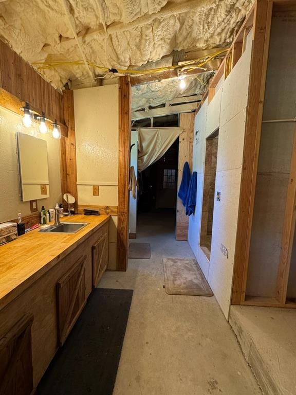 377056 E 1040th Rd, Okemah, OK 74859 - bathroom with a sink and unfinished concrete flooring