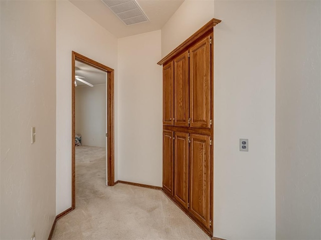 hall with light carpet